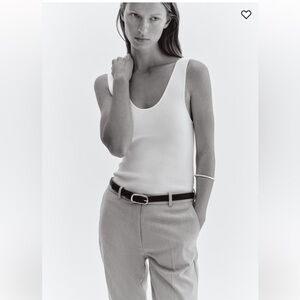 H&M Cream Ankle-length slacks in woven stretch fabric.